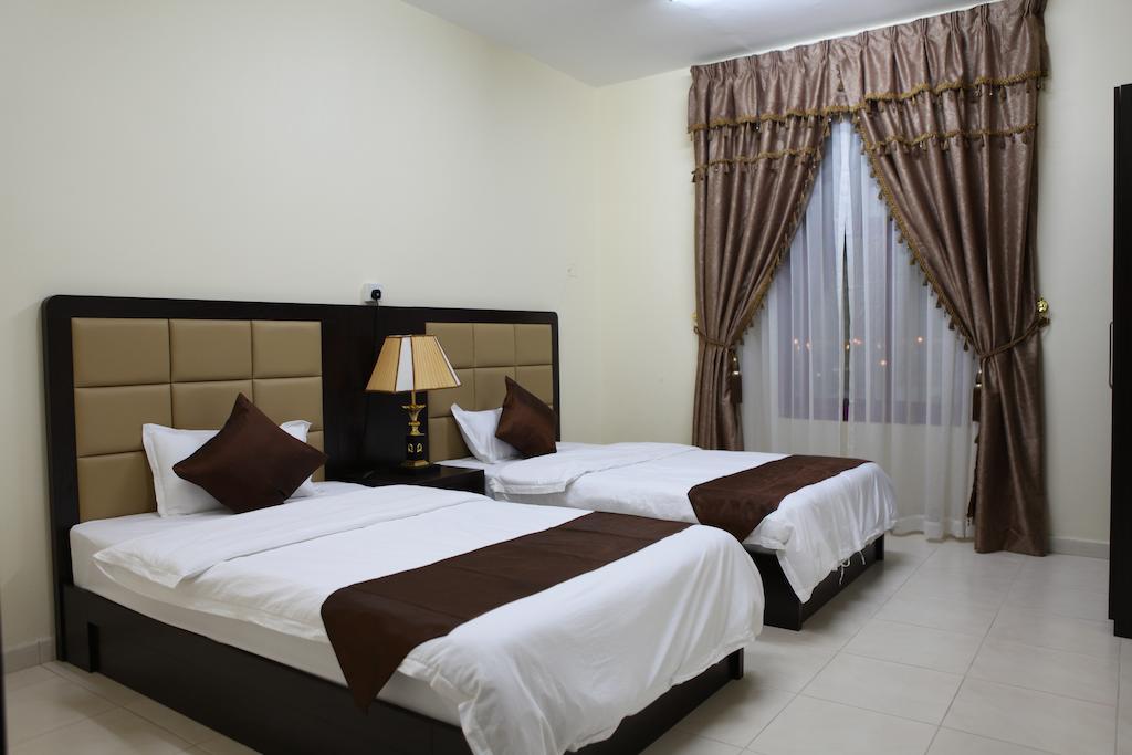 Oasis Residence Fudžajra Pokoj fotografie